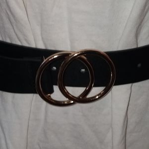 Ladies black belt with gold circular buckle
